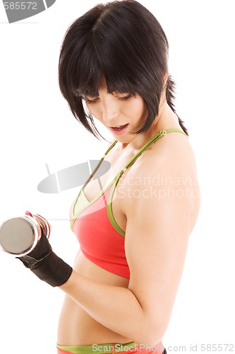 Image of muscular fitness instructor with dumbbells