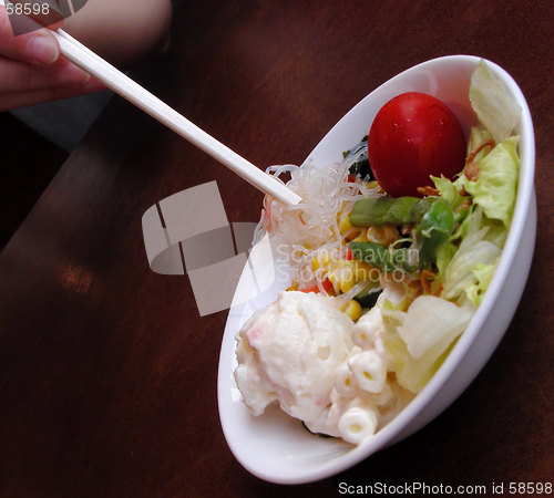 Image of Salad and chopsticks