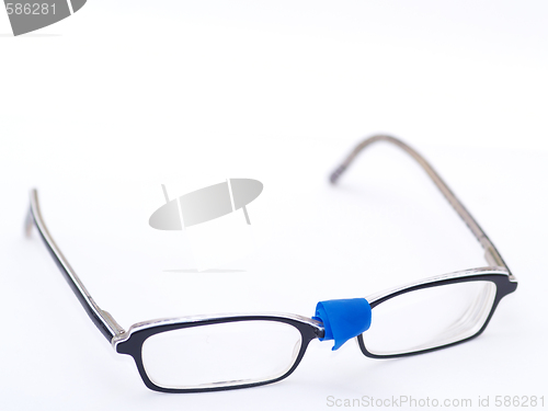 Image of broken eyeglasses