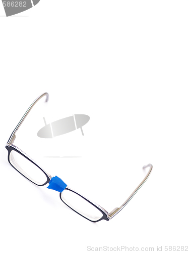 Image of broken eyeglasses