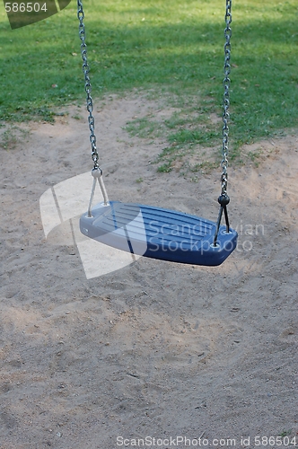 Image of Baby swinger at playground.