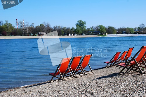 Image of Orange folding chairs