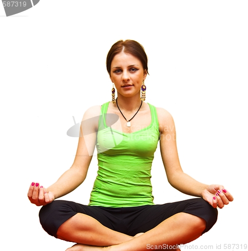 Image of Young girl doing yoga