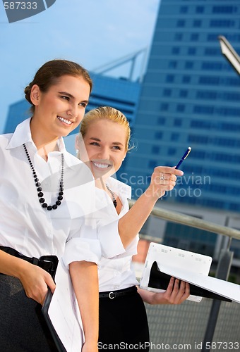 Image of two happy businesswomen