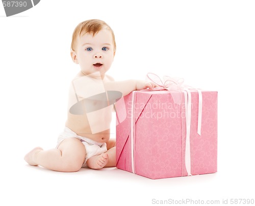 Image of baby boy with big gift box