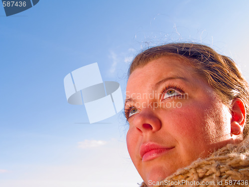 Image of Woman looking up at copyspace