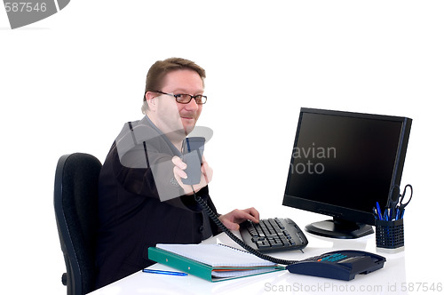 Image of Businessman on desk 