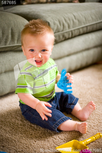 Image of Baby Boy with Toys