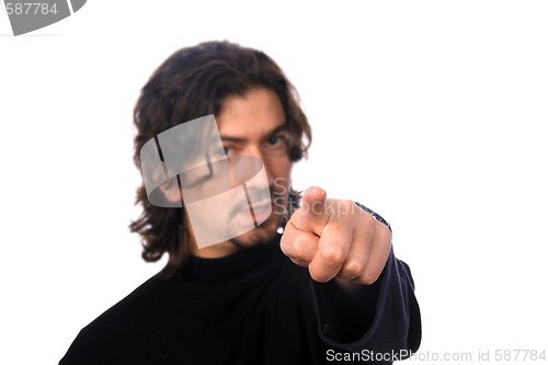 Image of casual man pointing (focus on the finger)