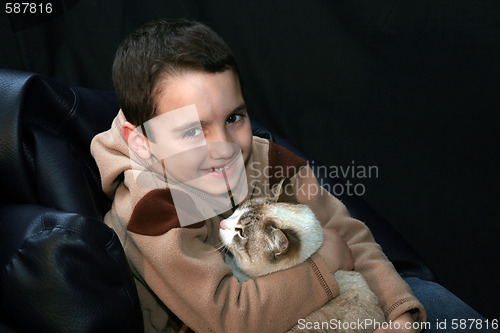 Image of boy with cat