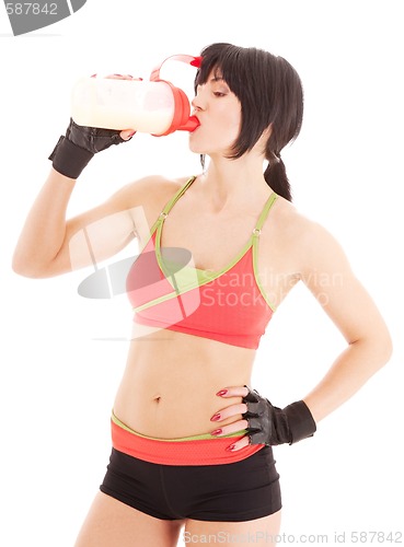 Image of fitness instructor with protein shake