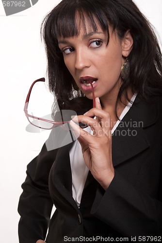 Image of Woman holding eyeglasses