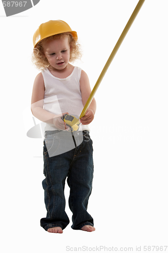Image of Little boy measuring