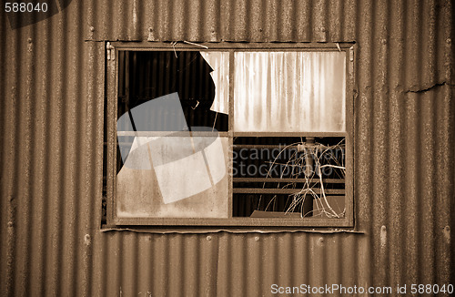 Image of old rusty metal tin shed
