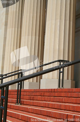 Image of Steps And Handrails Next To Columns