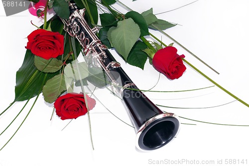 Image of Red roses and clarinet