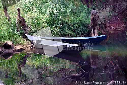 Image of boats over tranquil water