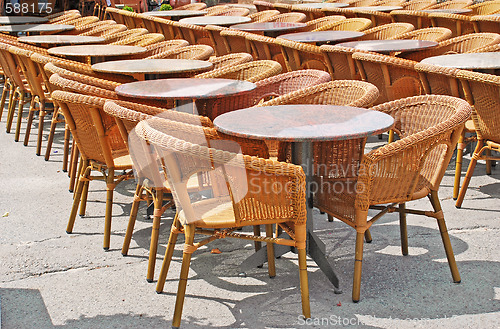 Image of chairs and tables in row