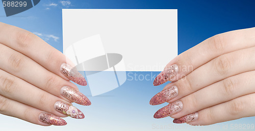 Image of hands and card