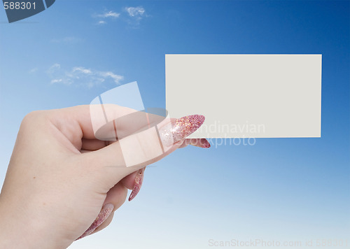 Image of hand with card