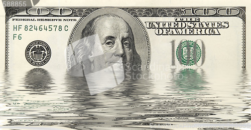 Image of dollars in water