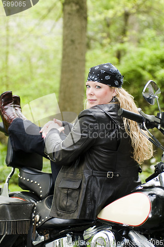 Image of woman on motorcycle