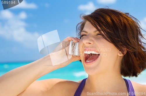 Image of happy woman with cell phone
