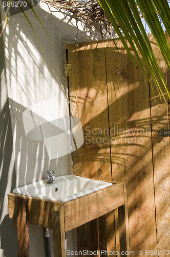 Image of outdoor sink washroom next to outhouse nicaragua