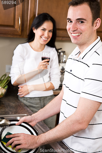 Image of Young couple in the kitchen