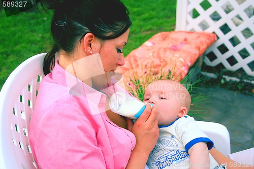 Image of Young mother with baby