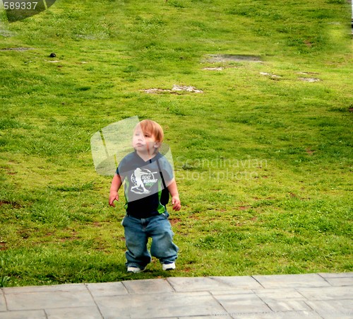 Image of Baby playing outside