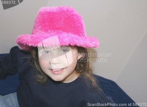 Image of Cute little girl in pink hat