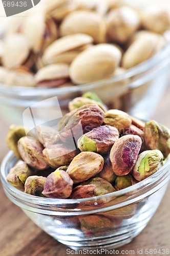 Image of Pistachio nuts in glass bowls