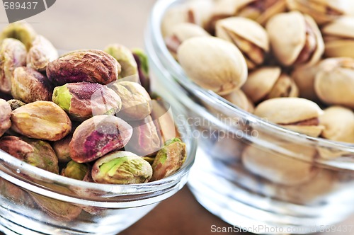 Image of Pistachio nuts in glass bowls