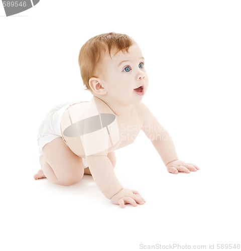 Image of crawling baby boy in diaper