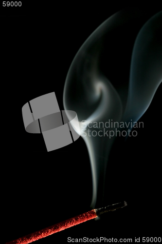 Image of incense smoke over black