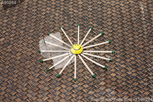 Image of Yellow smile on bamboo background