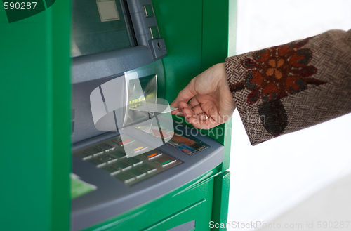 Image of Feminine hand with credit card