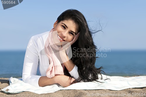 Image of Young native american woman at beach