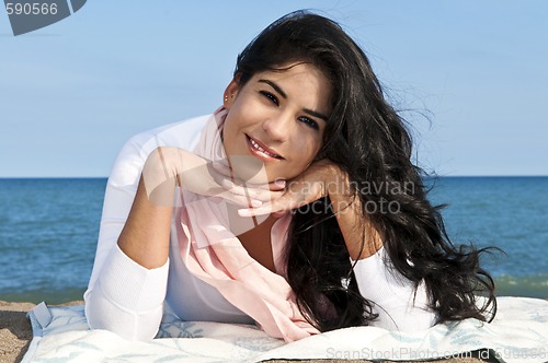 Image of Young native american woman at beach