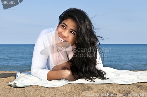 Image of Young native american woman at beach