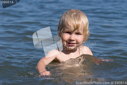 Image of child and sea