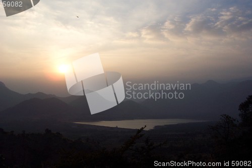 Image of sunset over mountain lake