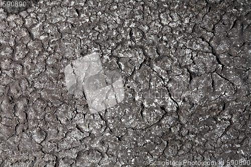 Image of chapped black surface