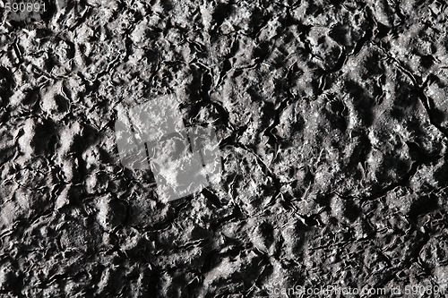 Image of chapped black surface