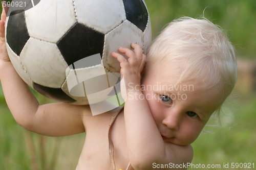 Image of little baby with soccer ball