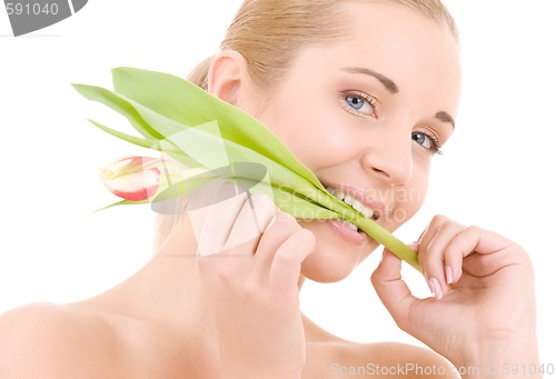 Image of happy woman with flower