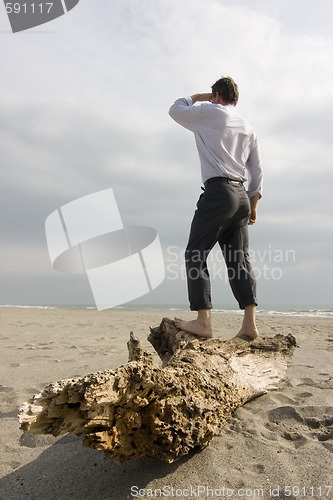 Image of Shipwrecked businessman