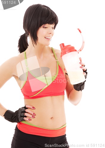 Image of fitness instructor with protein shake