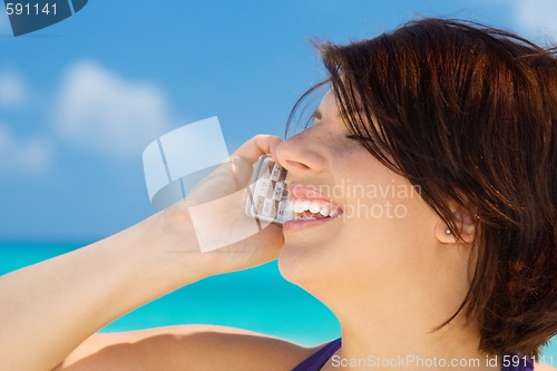 Image of happy woman with cell phone